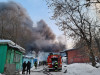Тушить горящий на площади 1 тыс. кв. м ангар в Москве отправили вертолеты