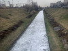 Поверхность реки Волковка в Петербурге покрылась белой пеной